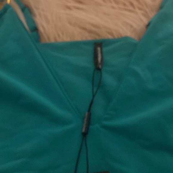 Beautiful deep v cut gold ring on shoulder one piece bathing suit… - Picture 4 of 7